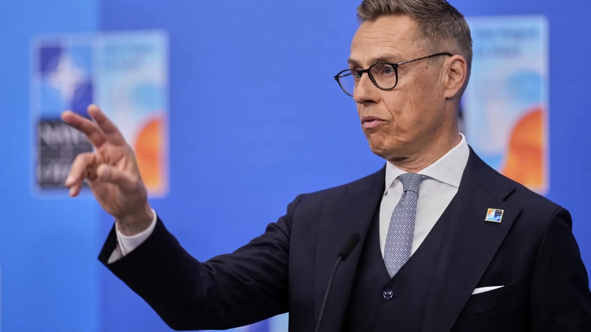 President Alexander Stubb of Finland speaking at a podium